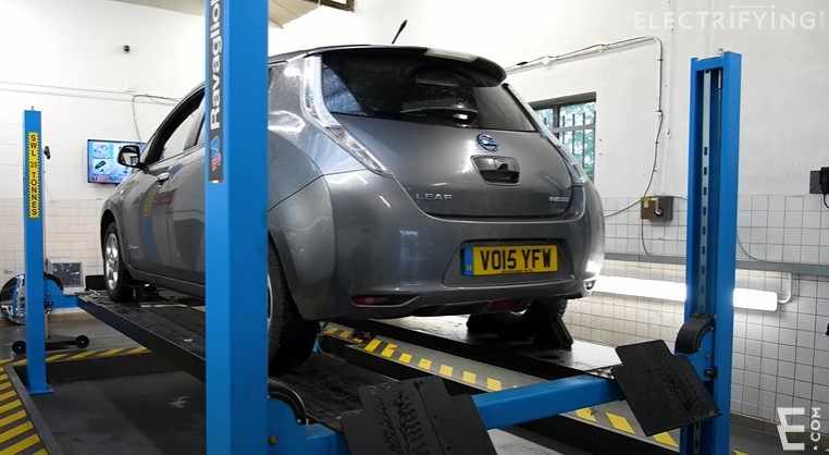 grey EV car at workshop