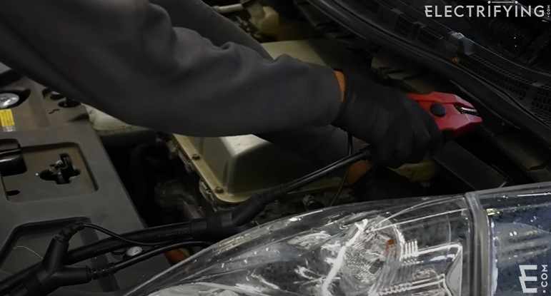 mechanic checking car