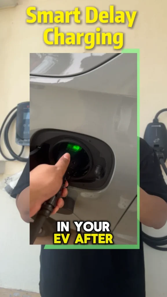 EV charging cable being plugged in with delayed charging set for off-peak hours