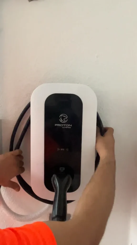 Wrapping the EV Charging Gun Cable around the Proton eMAS 7 Charger